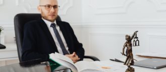 Lawyer sitting before a desk